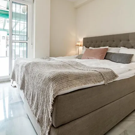 Sensational And Exotic 3-bedroom Retreat In Nueva Andalucia With A Palm Garden