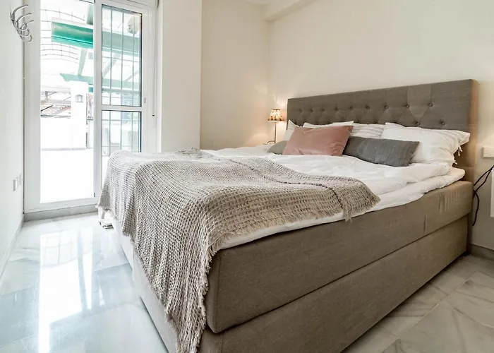 Sensational And Exotic 3-bedroom Retreat In Nueva Andalucia With A Palm Garden