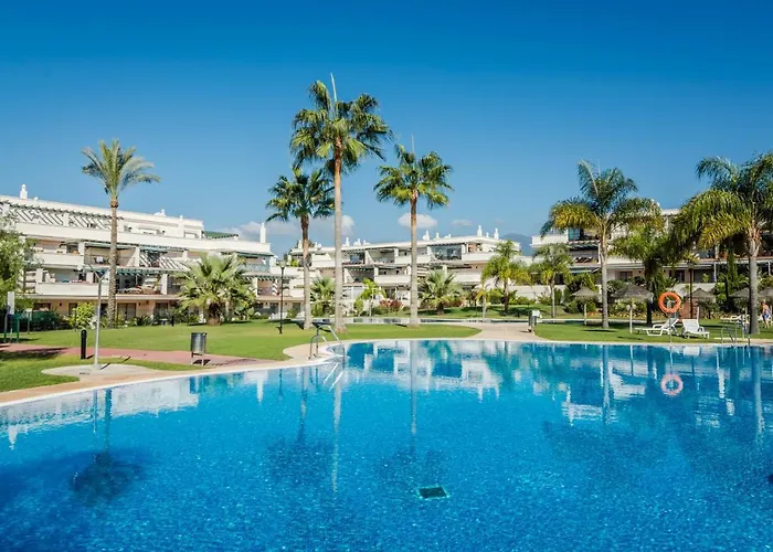 Sensational And Exotic 3-bedroom Retreat In Nueva Andalucia With A Palm Garden