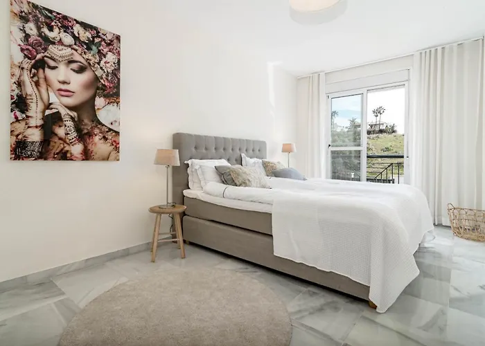 Sensational And Exotic 3-bedroom Retreat In Nueva Andalucia With A Palm Garden