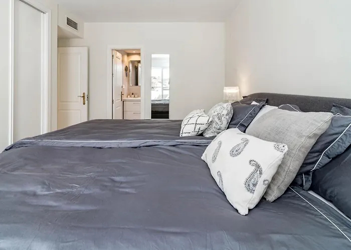 Sensational And Exotic 3-bedroom Retreat In Nueva Andalucia With A Palm Garden