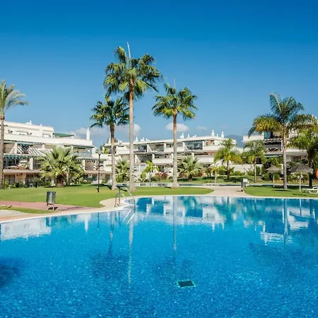 Sensational And Exotic 3-bedroom Retreat In Nueva Andalucia With A Palm Garden