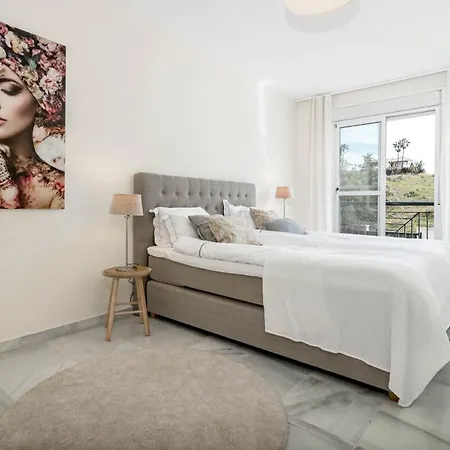 Sensational And Exotic 3-bedroom Retreat In Nueva Andalucia With A Palm Garden